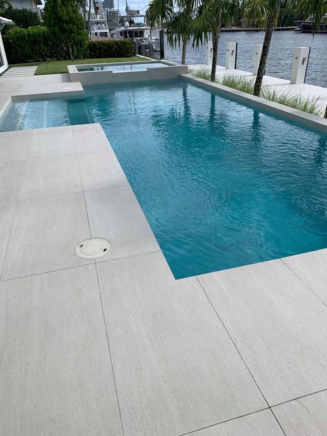 Pool Coping Ideas Modern, Pool Tiling Ideas, Pool Concrete Deck Ideas, White Pool Tile Waterline, Pool Handrail Ideas, Brushed Concrete Pool Deck, Brushed Concrete Patio, Pool Tiles Design, Modern Pool Tile Ideas