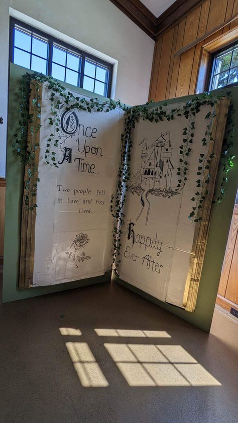 Storybook Graduation Party, Fairy Tale Diy Decor, Winnie The Pooh Book Backdrop, Fairytale Window Display, Fairytale Homecoming Decorations, Fairy Tale Room Transformation, Story Book Decorating Ideas, Fairy Tale Decorations Party, Storybook Themed Party