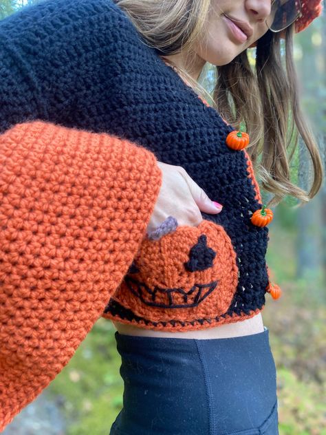 "The Pumpkin Patch Cardigan By @HighLevelBandanas A beginner-friendly crochet cardigan sure to turn heads this Fall!  Includes step-by-step photos & a tester lookbook! For personal use - please do not sell or reproduce this pattern. Tag me in your completed project - I would love to see it! This pattern will be fully customizable to your own measurements! Simply follow the measuring instructions in each section. How to read this pattern: This pattern uses no specific stitch or row count, due to #Ponchos #Pumpkin_Sweater_Crochet_Pattern #Crochet_Pumpkin_Sweater #Patch_Cardigan_Crochet Crochet Outfits Fall, Crochet Pumpkin Cardigan, Crochet Pumpkin Sweater, Halloween Crochet Cardigan, Crochet Halloween Cardigan, Crochet Fall Clothes, Pumpkin Cardigan, Pool Shoot, Patch Cardigan