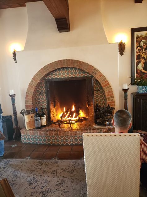 Santa Fe Fireplace Southwest Style, Spanish Revival Fireplace Ideas, Modern Southwest Fireplace, Terra Cotta Fireplace Surround, Adobe Fireplace Makeover, Fireplace Makeover Spanish Style, Saltillo Tile Fireplace Hearth, Southwest Style Fireplace, Spanish Style Tv Room