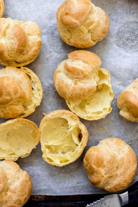 Cream puffs are made from a choux pastry (aka pâte à choux) which is just a light pastry dough made with flour, eggs, butter, and water. The puffed up hollow shells are perfect for filling with pastry cream or whipped cream for an easy, elegant dessert! #creampuffs #best #easy #classic #french #chouxpastry #recipe #dessert #filling #homemade #howtomake Easy Cream Puffs Recipe, French Cream Puffs, Cream Puffs Recipe Easy, Cream Puffs Recipe, Homemade Cream Puffs, Pastries Recipes Dessert, Pastry Cream Filling, Creme Puff, Classic French Desserts