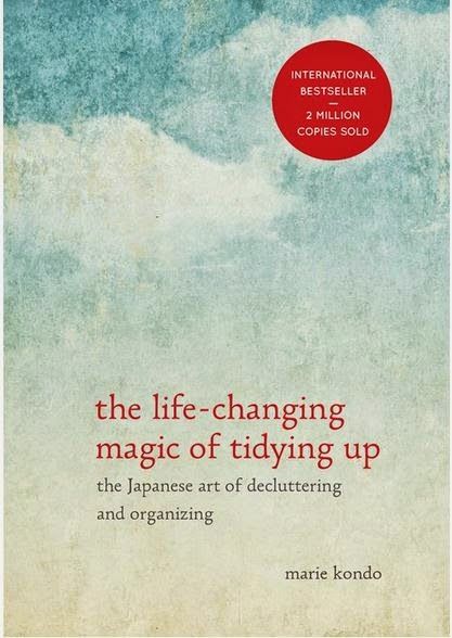 "When you come across something that's hard to discard, consider carefully why you have that specific item in the first place. When did you get it and what meaning did it have for you then? Reassess the role it plays in your life. If, for example, you have some clothes that you bought but never wear, examine them one at a time. Where did you buy that particular outfit and why? Life Changing, Book Cover, Art