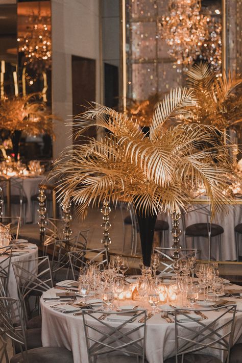 The Great Gatsby Wedding Theme, Golden Centerpieces, Palm Leaf Centerpiece, Black And Gold Centerpieces, Gatsby Decor, Gala Centerpieces, Calla Lily Centerpieces, Art Deco Centerpiece, Gatsby Event