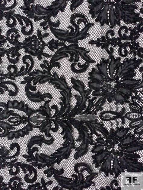 This black Victorian design corded lace designer fashion fabric will take you back to the era of corsets, bonnets, top hats, bustles and petticoats. SKU: 12368 Content: Polyester Color: Black Width: 57 inches Gothic Fabric Pattern, Victorian Lace Pattern, Gothic Lace Pattern, Vintage Patterns Design, Black Lace Aesthetic, Victorian Pattern Design, Black Fabric Texture, Lace Fabric Pattern, Rh Patterns