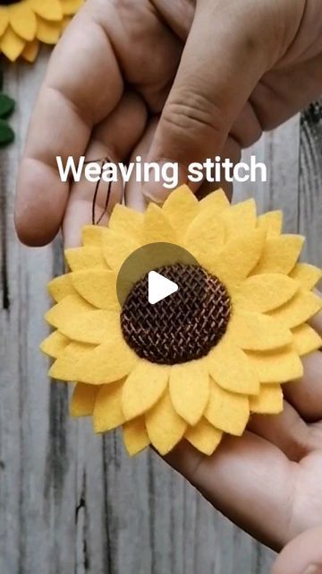 DusiCrafts Dušanka Sirše on Instagram: "The sunflowers and the Weaving stitch.

Summer is here 😎🌞🌻🌅
And sunflowers are perfect for this time of year.

Make yourself a brooch, a hairclip or an ornament.

Weaving is one of the options how to decorate flower center. And it is covered (at normal speed) with additional explanation in the video tutorial as part of the pattern. 

➡️ If you would like the direct link for the PDF Pattern in my shop, just comment "SUNFLOWER" on this post.

#DusiCrafts #handsewing #feltcrafter #feltcrafts#feltornaments #summercrafts #weavingstitch #handembroidery #workingwithfelt" How To Make A Sunflower, Felt Sunflower Template Free Pattern, Felt Sunflower Diy, Felted Sunflowers, Sunflower Felt Flower Diy, Embroided Sunflower, Yellow Felt Flowers, Summer Is Here, Flower Center