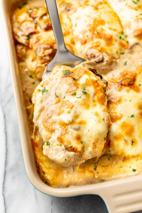 This is the best recipe for Chicken Gloria! This creamy chicken mushroom casserole has an irresistible sherry cream sauce, mushrooms, and melty Muenster cheese. It's perfect for entertaining! Chicken Gloria Casserole, Chicken Gloria, V Neck Bridesmaid Dress, Chicken Breast Casserole Recipes, Cheesy Chicken Recipes, Creamy Chicken Casserole, Chicken Breast Recipes Baked, Dresses For Weddings, Chicken Entrees