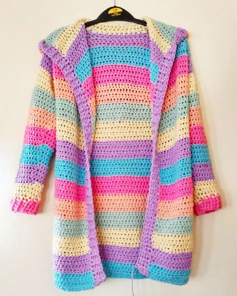 I've rounded up a collection of plushies, sweaters, pillows, and more, all with a rainbow color scheme. Stripe crochet cardigan pattern for beginners. Practical Crochet, Crocheted Clothes, Crochet Dreams, Crochet Cardigan Pattern Free, Crochet Hoodie, Gilet Crochet, Crochet Rainbow, Crochet Unicorn, Rainbow Crochet