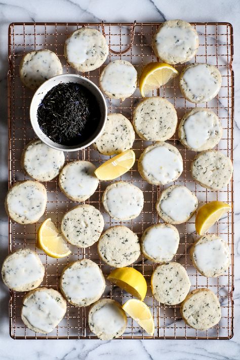 Simple and delicious Earl Grey Shortbread Cookies with Lemon Glaze. A rich and buttery addition to your Holiday cookie tin. Earl Grey Shortbread Cookies, Earl Grey Shortbread, Earl Grey Cookies, Lemon Glaze Recipe, Cookies With Lemon, Whipped Shortbread Cookies, Cookie Tin, Lemon Glaze, Tea Party Food