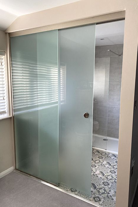 Go Glass | Beautiful frame-less sliding glass doors made to size Toughened Glass Design, Sliding Glass Door Bathroom, Dressing Mirror Designs, Bathroom Sliding Door, Glass Door Bathroom, Frameless Glass Doors, Bathroom Partitions, Washroom Design, Sliding Glass Doors