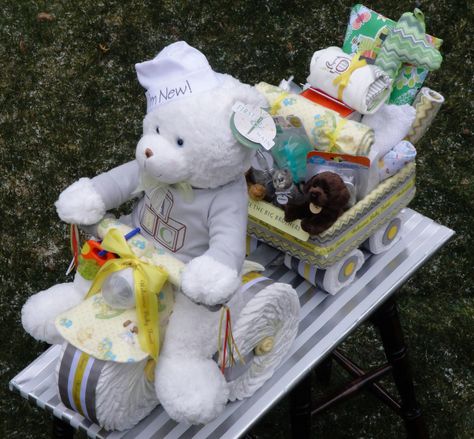 Tricycle Diaper Cake pulling a wagon filled with goodies. www.facebook.com/DiaperCakesbyDiana Diaper Tricycle, Diaper Motorcycle Cake, Diaper Cakes Tutorial, Diaper Cake Instructions, Diy Diaper Cake, Diaper Gifts, Idee Babyshower, Baby Shower Baskets, Diaper Cake Boy