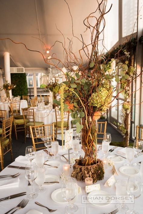 Tall centerpiece with curly willow and cork Willow Centerpieces Wedding, Tree Branches Wedding Decor, September Wedding Decor, Tree Branch Wedding Decor, Curly Willow Centerpieces, Mushroom Dinner, Woodlands Wedding, Hudson Hotel, Log Centerpieces