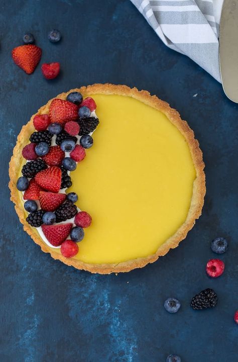 This classic lemon tart recipe is one that you will keep in your baking repertoire for a long time. With a sweet shortbread dough and a lip-puckering tart lemon curd filling, it is the lemon lover's dream. #tart #lemontart #recipe #sweets #dessert #spring #springrecipe Sweet Tart Dough Recipe, Tart Dough Recipe, Lemon Curd Dessert, Dessert Spring, Tart Lemon Curd, Lemon Curd Tart, Lemon Tart Recipe, Curd Filling, Tart Dough