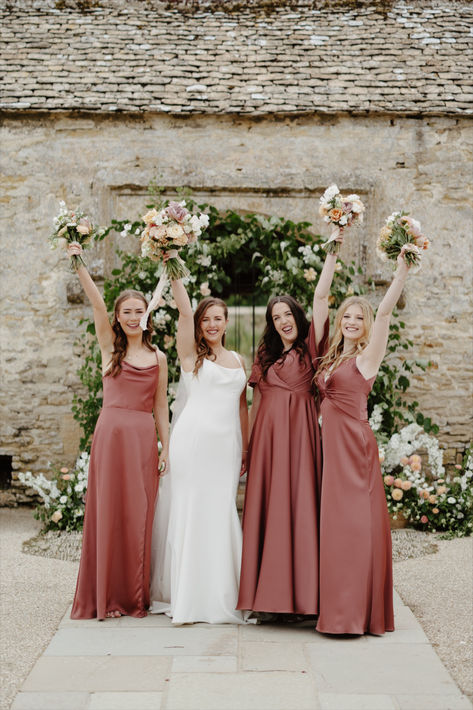 Explore the beauty of desert rose tones for your wedding! 🌹✨From chic dresses to floral arrangements, find inspiration that blends warmth and style.  
📷 @chloeelyphotography
#RustWedding #BridesmaidFashion Desert Rose Bridesmaid Dresses, Desert Rose Bridesmaid, Maroon Bridesmaid, Maroon Bridesmaid Dresses, Rusting Wedding, Dusty Rose Bridesmaid Dresses, Rose Bridesmaid Dresses, Dusty Rose Wedding, Bridesmaid Style