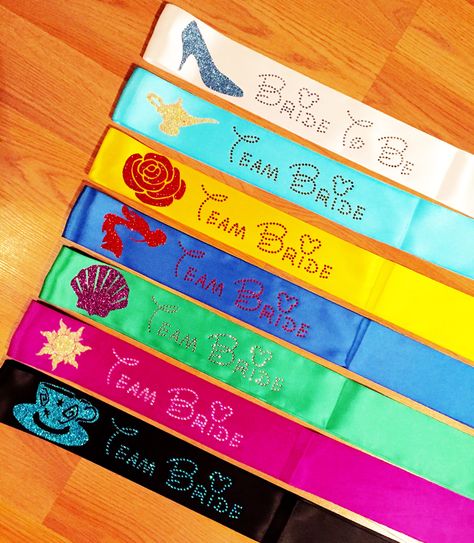 Disney Sashes Make Every Bridal Party Feel Like A Princess Princess Bachelorette Party, Wedding Ideas Disney, Disney Themed Bridal Shower, Disney Wedding Ideas, Disney Bachelorette Parties, Disney Bachelorette, Disney Bridal Showers, Disney Inspired Wedding, Feel Like A Princess