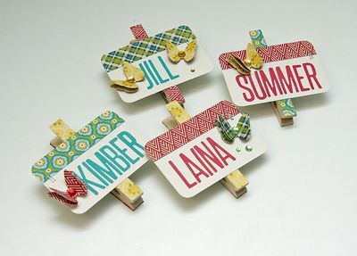 OK.  What about blank nametags with washi tape on top before laminating and magnets.  Moms write their name on the laminated tag and add stickers/flowers for kids? Clothespin Name Tags, Scrap Embellishments, Diy Name Tags, Mops Crafts, Martha Stewart Punches, Women's Retreat, Ra Ideas, Daisy Girl Scouts, Womens Retreat