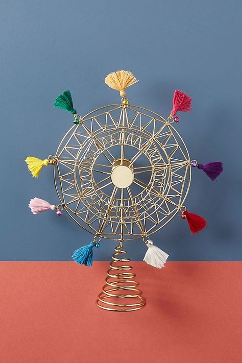 Tasseled Ferris Wheel Tree Topper | Anthropologie Holiday Decor Anthropologie Holiday Decor, Best Christmas Tree Toppers, Unique Tree Toppers, Diy Tree Topper, Diy Christmas Tree Topper, Anthropologie Holiday, Unique Holiday Decor, Cool Christmas Trees, Christmas Tree Themes