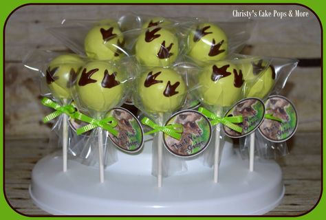 Jurassic Park Cake Pops- Cake Pops & More Easley, SC Jurassic Park Cake, Dinosaur Cake Pops, Jurassic World Party, Jurassic World Cake, Dinosaur Party Ideas, World Ideas, Jurassic Park Birthday Party, Jurassic Park Party, Jurassic Park Birthday