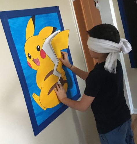 Pokémon party game Pin the tail on the Pikachu Pokemon Birthday Party Ideas Games, Pokemon Birthday Pictures, Pokemon Go Party Ideas, Pikachu Pin The Tail, Pikachu Party Games, Pokemon Birthday Decorations Ideas, Pokemon Party Games Boys, Pokemon Birthday Party Outside, Pokemon Pin The Tail