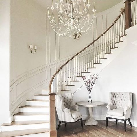 At our first meeting with our darling client we talked about her vision for a curved staircase in the entryway. And now here we are. Love how this turned out! #entrywaygoals Curved Staircase Foyer, Indoor Stair Railing, Wooden Staircase Design, درج السلم, Luxury Staircase, Foyer Staircase, House Staircase, Staircase Wall, Staircase Remodel