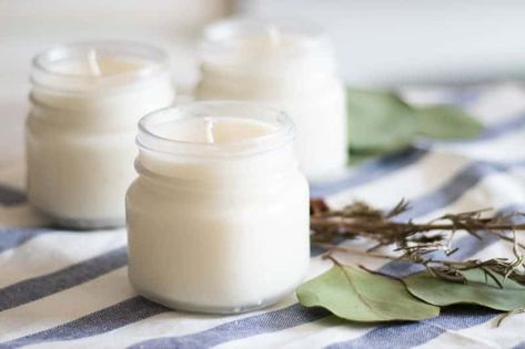 Making your own candles with natural ingredients and essential oils is a much healthier way to cozy up your home.  Essential oils in candles is a wonderful way to get aromatherapy benefits and purify the air in your home. Learn how to make the easiest candles and the best Christmas blends to add to them for this holiday season. #diycandles #howtomakecandles #diychristmas #homemadecandles Essential Oil Christmas Blend, Diy Dishwasher Soap, Homemade Christmas Candles, Diy Holiday Candles, Our Oily House, Beeswax Candles Diy, Christmas Candles Diy, Christmas Scented Candles, Christmas Crafts To Sell