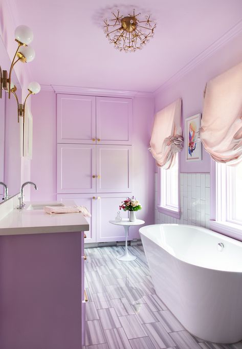 The designer transformed her young daughter's bathroom into one of the most colorful spaces in the home that exudes a style that is suitable for any age. This bold purple bathroom is stylish and can easily be changed with paint for a fresh look down the road. #hometour #homedesign #homedecor #marthastewart #inspiration #details Lavender Bathroom, Pink Dining Rooms, Decoration Hall, Purple Bathrooms, Bathroom Paint Colors, Brown Bathroom, Bathroom Color, 아파트 인테리어, Design Del Prodotto