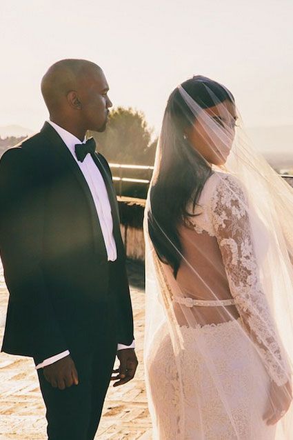 Kim Kardashian and Kanye West said their "I dos" on May 24, 2014, and by Sept. 1, 2014, Kim was still sharing pics from their lavish wedding weekend! In promotion of the Keeping Up with the Kardashians season finale, the newlywed Instagrammed a stunning photo of her posed with her groom, writing: "#LOVE #TONIGHT #FINALE." From the high-fashion digs to the A-list guests to the European jet-setting, this was a wedding fit for a Hollywood power couple! Click the pics to go inside Kimye's ...    118 Kimye Wedding, Kanye West Wedding, Celebrity Wedding Hair, Jamie Hince, Kim Kardashian Wedding, Kardashian Wedding, Estilo Kardashian, Kim Kardashian Kanye West, Kim And Kanye