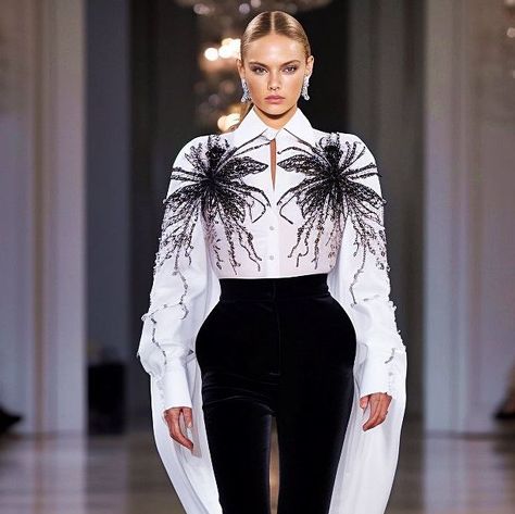 AI Prințesa Digitală on Instagram: "🕸️SPIDER RTW🖤 Featuring button up capes and reconstructed blazer corsets or blouses, my new RTW season with the spider motive is adorned with crystals and shining embellishments, paired with legging boots. Concept bu @printesa.digitala for the Spider Virtual Series, assisted by AI.🖤" Spider Corset, Reconstructed Blazer, Legging Boots, The Spider, Corsets, Embellishments, Cape, Button Up, Blouses