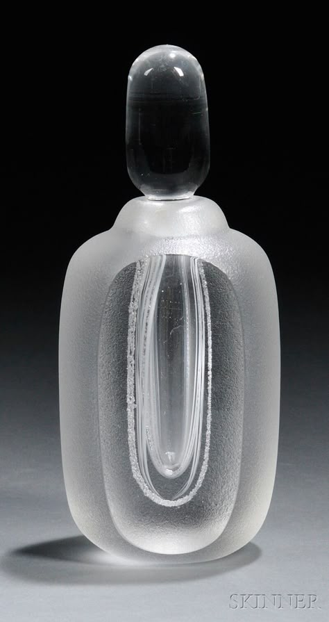 Göran Wärff for Kosta Perfume Bottle Art glass Sweden Ovoid body in frosted glass with one faceted side exposing narrow hollowed interior, clear glass stopper, incised on base Kosta Ateljé G. Wärff. Skincare Container, Bottle Design Ideas, Tiny Objects, Cosmetic Branding, Helena Rubinstein, Perfume Art, Perfume Bottle Design, Magic Bottles, Perfume Bottle Art