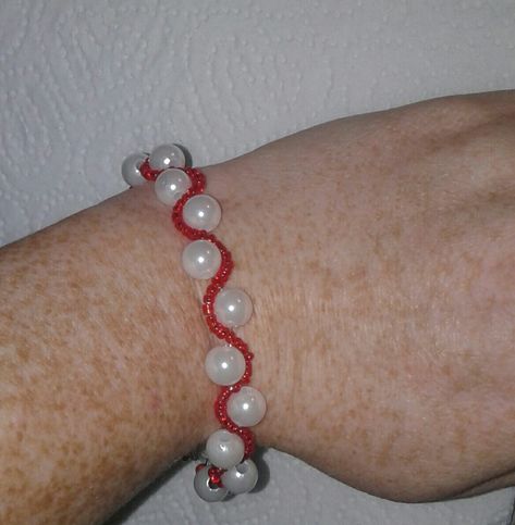 Red and white wavy bracelet made with red seed beads and white plastic beads. Wavy Bracelet, Seed Bead Crafts, Handmade Beaded Jewelry, Plastic Beads, Beaded Jewelry Diy, Jewelry Diy, Handmade Accessories, Eras Tour, Bead Crafts