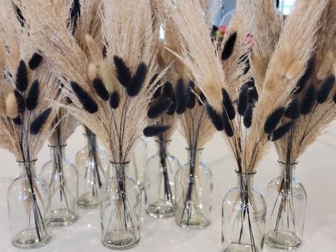 Tan Feathers In Vase, Hints Of Black Wedding, Black And White Wedding On A Budget, Touch Of Black Wedding, Tall Vase Arrangements Wedding, Black And White Modern Boho Wedding, All Black Boho Wedding, Black Boho Centerpiece, Black Boho Wedding Centerpieces