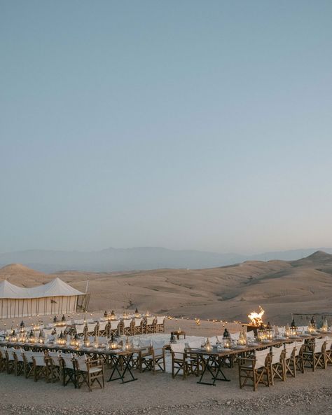 An unforgettable welcome party we created in the middle of a desert with an all white dress code, celebrating the arrival of guests to Morocco for a multi day wedding following a more intimate roof top gathering in the medina. With poolside drinks as the sun set, and a spectacular dining experience under the stars surrounding my thousands of candles, before a live fire show and music to dance around the fire pits. 📷 @katiejulia_ #destinationwedding #partyplanner #weddingplanner #weddingin... Wedding Egypt, Marrakech Wedding, Venice Lido, Global Wedding, Moorish Design, Celebration Around The World, Luxury Weddings, Best Wedding Planner, Luxury Wedding Planner