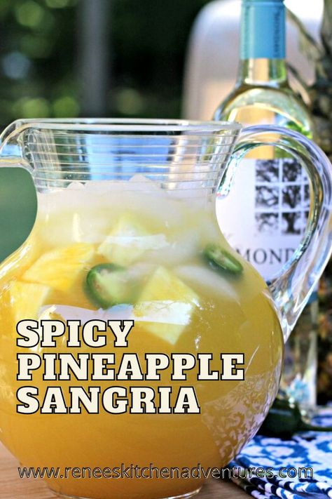 Spicy Pineapple Sangria by Renee's Kitchen Adventures. Easy to make, deliciously sweet and spicy, sangria. Start by making jalapeno infused simple syrup and then combine with wine and pineapple juice for a delicious summertime adult beverage everyone loves! Alcoholic Lemonade Drinks, Spicy Sangria, Infused Simple Syrup, Pineapple Sangria, Spicy Pineapple, Fun Drinks Alcohol, Spicy Cocktail, Wine Spritzer, Jalapeno Pepper