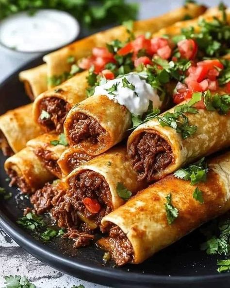 old fashion recipes | Crispy Beef Taquitos with Melted Cheese  | Facebook Mexican Taquitos, Health Chicken Recipes, Shredded Beef Recipe, Beef Taquitos, Shredded Beef Recipes, Taquitos Beef, Marinated Cheese, Mexican Shredded Beef, Taquitos Recipe