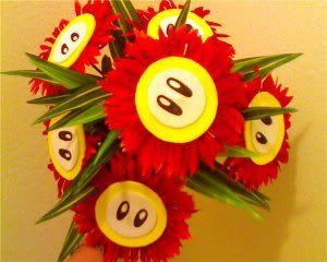 DIY Mario fire flower bouquet (silk flowers and craft foam) Mario Flower, Artificial Flower Bouquets, Gamer Wedding, Geeky Wedding, Sweet 16 Themes, Ice Flower, Geeky Craft, Geek Wedding, Super Mario Birthday