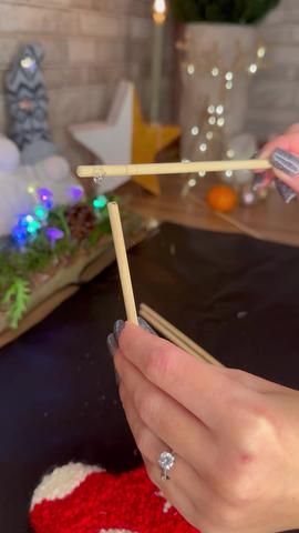 Are you looking for DIY Christmas porch decorations? I have several e... | TikTok Diy Bamboo Sticks Crafts, Bamboo Sticks Ideas, Bamboo Sticks Crafts, Christmas Porch Decorations, Decorating With Sticks, Jute Craft, Diy Straw, Stick Christmas Tree, Arts And Crafts For Adults