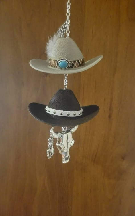 Bring a western vibe to your vehicle with our handmade cowboy hat car charms and matching keychains. - Handmade and customizable mirror hangers with optional matching keychains. - Car charms come with 5 inch or 3 inch hats (we recommend 5 inch unless you have a very small car) - Easy installment/adjustments with lobster claw necklace clasp at the end of the chain. This makes it easy to adjust the length of the charm! - Check out our shop for different designs or message us with any ideas if you Western Gifts Ideas, Cute Western Car Accessories, Cowboy Hat Car Charm, Western Car Decor, Western Car Accessories, Western Mirror, Rearview Mirror Charms, Mini Cowboy Hat, Mini Cowboy