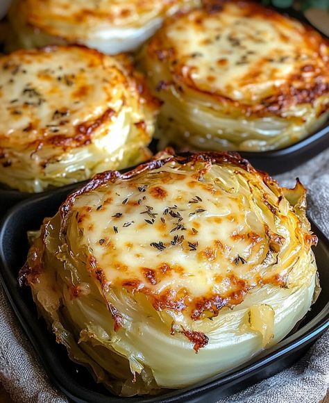 If you're looking for a unique and tasty way to enjoy cabbage, these Cheesy Baked Cabbage Steaks are the perfect recipe to try! Pork Chop On Cabbage Steak, Side Dishes For Corned Beef And Cabbage, Cabbage Sliced And Baked, Grill Cabbage Steaks, Roasted Cabbage Slices, Red Cabbage Steaks Recipe, Cabbage Recipe Baked, Oven Roasted Cabbage Recipes, Cabbage Blackstone