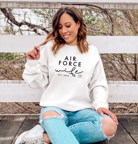 We absolutely love this new sweatshirt. Perfect to let your significant other know just how proud you are! Fiance Sweatshirt, Air Force Wife, Mama Crewneck Sweatshirt, Wifey Shirt, Grace Shirts, Airforce Wife, Wifey Sweatshirt, Mama Crewneck, Mrs Sweatshirt