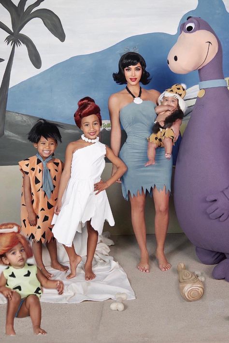 100+ Best Celebrity Halloween Costumes of All Time - Hollywood Costume Ideas Flintstones Halloween Costumes, Flintstones Costume, Look Disco, Dino Costume, Best Celebrity Halloween Costumes, Themed Halloween Costumes, Rock Family, Kardashian Kids, Halloween Express