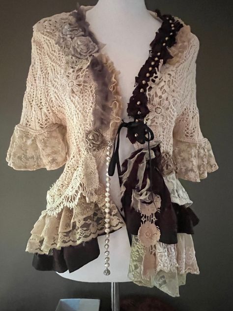 Unique one of a kind, re-worked and hand embellished Romantic Bohemian shabby chic cotton crochet cupid top dappled tea stained and embellished with a garden bed of handmade silk and material flowers in hues of cream, off white, white, beige and brown. Reworked from vintage crochet, silks, vintage flowers on a beautiful crochet top. Adorned with lush vintage silk, lace and various vintage petals, material & silk hand sculpted flowers, laces, trims, appliques and scattered beading. Perfect for a Shabby Chic Clothing Style, Beaded Tops Diy, Shabby Chic Clothes Boho, Upcycled Linens, Sculpted Flowers, Dream Flower, Bohemian Crochet, Material Flowers, Shabby Chic Clothes