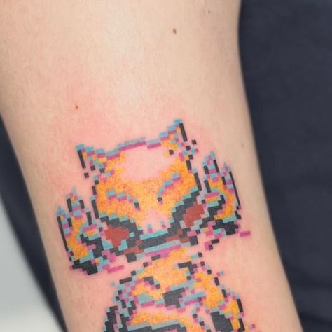 Pixel Tattoos ₍•͈ᴗ•͈₎ on Instagram: "Glitchy, chromatic shifty Abra  This was one of the most fun tattoos. I definitely wanna make more glitchy/chroma-shift pixel tattoos for y’all   Got a couple things to share with y��’all when I get home from my trip~" Glitch Effect Tattoo, Glitch Art Tattoo, Pixelated Pokemon Tattoo, Pixel Hearts Tattoo, Pixel Art Tattoo, Glitch Cross Stitch, Pixel Tattoo, Floral Back Tattoos, Funky Tattoos