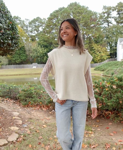 NEW ARRIVAL ALERT! Introducing the Rowan sweater vest in cream. You guys always sell out any neutral sweater vests I bring in. Bringing a new one in was long overdue… set your alarms for tomorrow, 11.3 at 6pm est!🤍 #NewArrival #SweaterVest #FallLayers #NeutralOutfit #BoutiqueStyle #RowanVest #FallFashion #WardrobeStaple #ModestFashion #ShopSmall Tunic Sweater Vest Outfit, High Neck Sweater Vest Outfit, Sweater Vest With Lace Undershirt, Womens Sweater Vest Outfit, Styling A Sweater Vest, White Sweater Vest Outfit, Sweater Vest Outfits For Women, Collar Under Sweater, Sweater Vest Outfit Women