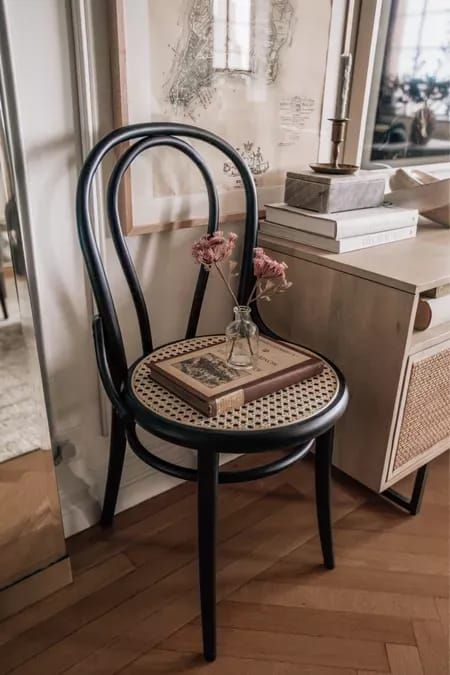 black cane chair, dining chairs, media console, home, home decor, decor, home decor ideas, living room, gallery wall, candlestick, apartment decorating | @prettyinthepines, New York City Black Cane Chairs Dining Rooms, Black Cane Chair, Tattoo Shop Interior, Living Room Designs Cozy, Pretty In The Pines, Living Room Gallery Wall, Inspirational Homes, Metal Bistro Chairs, Room Gallery Wall