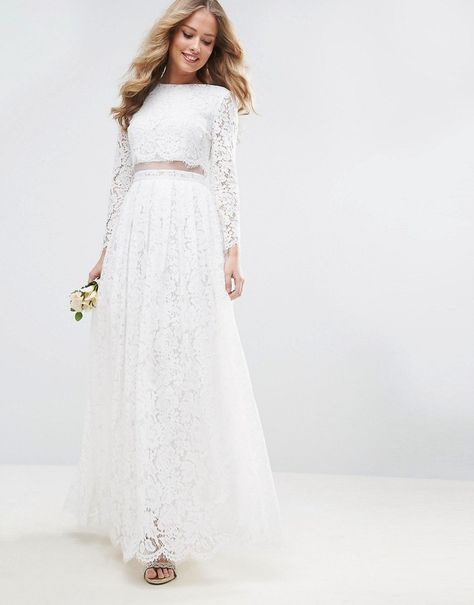 Lovely traditional gown, great for Autumn, winter weddings where coverage is needed  and would suit almost any figure. Could add a lovely veil to get the complete look.  Asus Bridal Lace Long Sleeve Crop Top Maxi Dress Wedding Crop Top, Asos Bridal, Asos Wedding Dress, Maxi Wedding Dress, Crop Top Wedding Dress, Long Sleeve Bridal Dresses, Wedding Dresses Uk, Bridal Skirts, Spring Maxi Dress