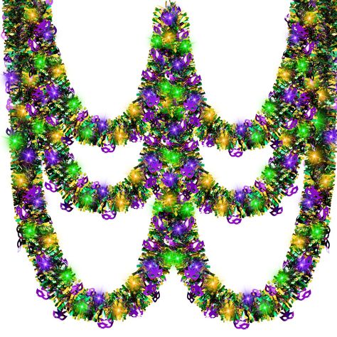 PRICES MAY VARY. Value Package:You will receive 2 pieces of metallic mardi gras tinsel garlands and 2 pieces of LEDs light strings, enough quantity and length for you to decorate, add more festive atmosphere to your home, metallic luster colors and bright lights will make your party more memorable. Size Information:Each metallic twist garland is about 32.8 feet /10 meters long, 3.5 inches /9 cm wide;The size of each LEDs string is about 32.8 feet /10meters long, it is long enough to better attra Carnival Design, Hoco Ideas, Mardi Gras Carnival, Tinsel Garland, Mardi Gras Decorations, Novelty Lights, Glitter Decor, Mardi Gras Party, Wedding Party Supplies