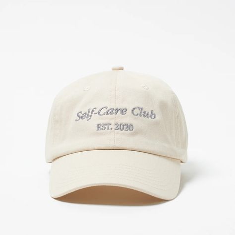 A limited edition piece celebrating our one year anniversary. This cream hat features blue embroidered words with KIBON logo on the back and adjustable straps. 100% CottonAdjustable buckle closure6 panel curved brim Wash on a gentle setting Wash on low temperature, no more than 30 degrees Wash by hand if possible Do no Brand Merch Ideas, Company Merchandise Ideas, Branded Hats, Funny Baseball Hat, Embroidered Ideas, Embroidered Words, Hats Ideas, Minimal Shirt Design, Cream Hat