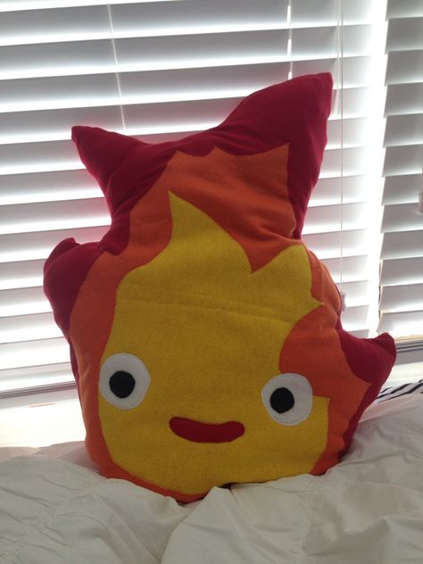 Made this giant Calcifer pillow last night! Calcifer Pillow, Ghibli Nursery, Studio Ghibli, Last Night, Dinosaur Stuffed Animal, Nursery, Mural, Pillows, Toys