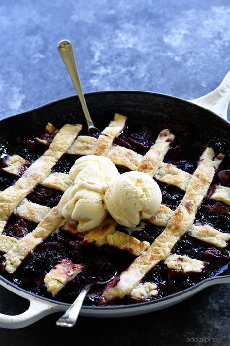 Southern Blackberry Cobbler Recipe - This blackberry cobbler makes a classic dessert. Including a lattice top and pastry dumplings, this blackberry cobbler is a favorite. // addapinch.com Blackberry Cobbler With Pie Crust, Blackberries Dessert, Cooked Peaches, Southern Blackberry Cobbler, Old Fashioned Blackberry Cobbler, Southern Baking, Pie Crust Dessert, Blackberry Filling, Blackberry Cobbler Recipe