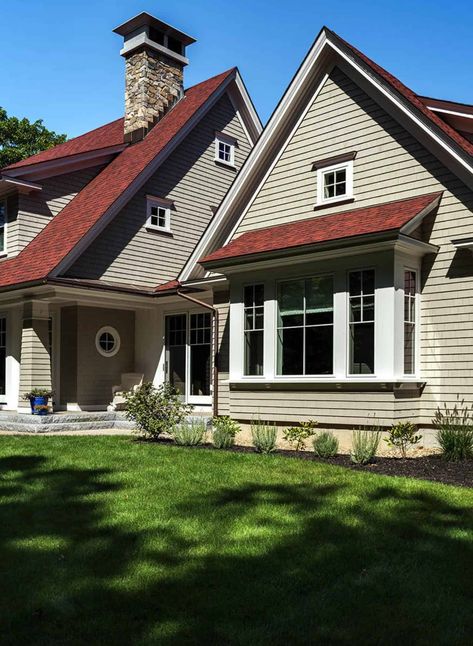 Charming New England hideaway boasts warm and inviting details House Colors With Red Roof, Red Roof Exterior Paint Colors, Red Brown Roof Exterior Paint, Red Roofed Houses, Red Brown Shingles House Colors, House With Red Brown Roof, Red Siding House Exterior With Stone, Red Roof House Colors Home Exteriors, Countrylane Red Hardie Siding