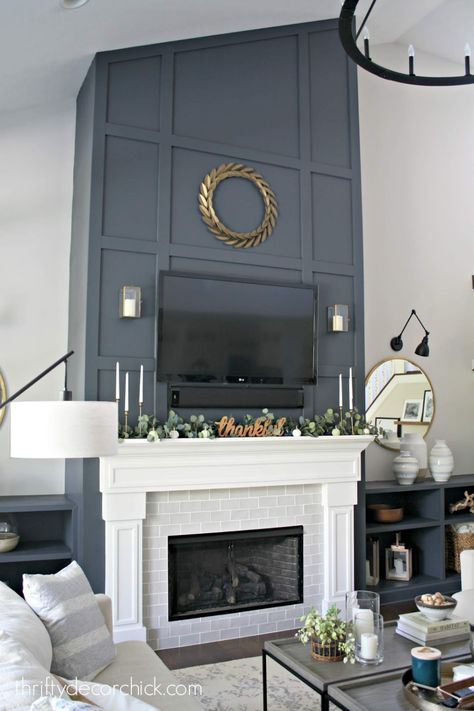 Dramatic fireplace wall makeover! from Thrifty Decor Chick Tall Fireplace Wall, Fireplace Wall Makeover, Dramatic Fireplace, Fireplace Accent Walls, Molding Ideas, Tall Fireplace, Wall Makeover, Thrifty Decor Chick, Accent Walls In Living Room